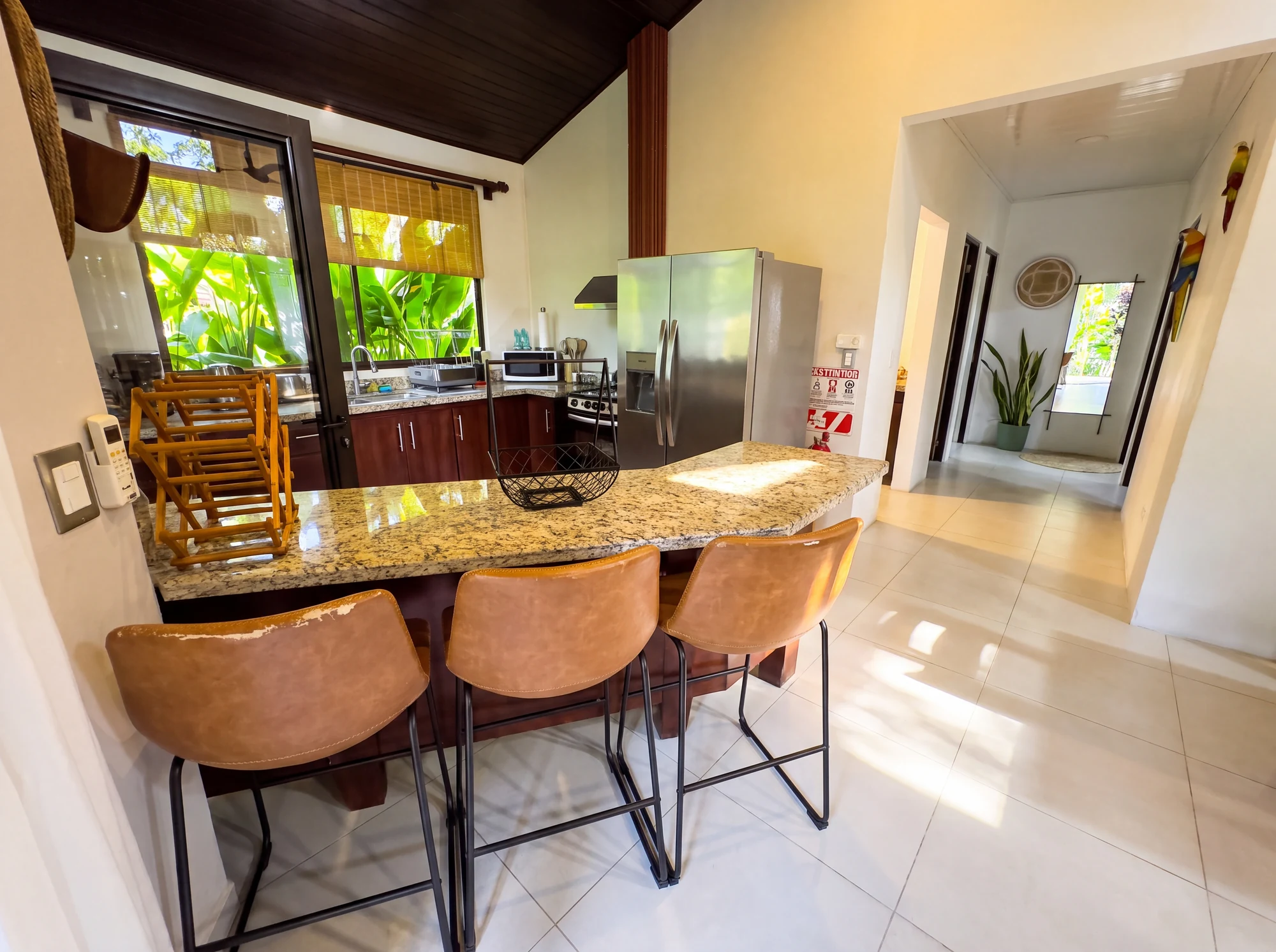 Bromelias Home kitchen bar and hallway